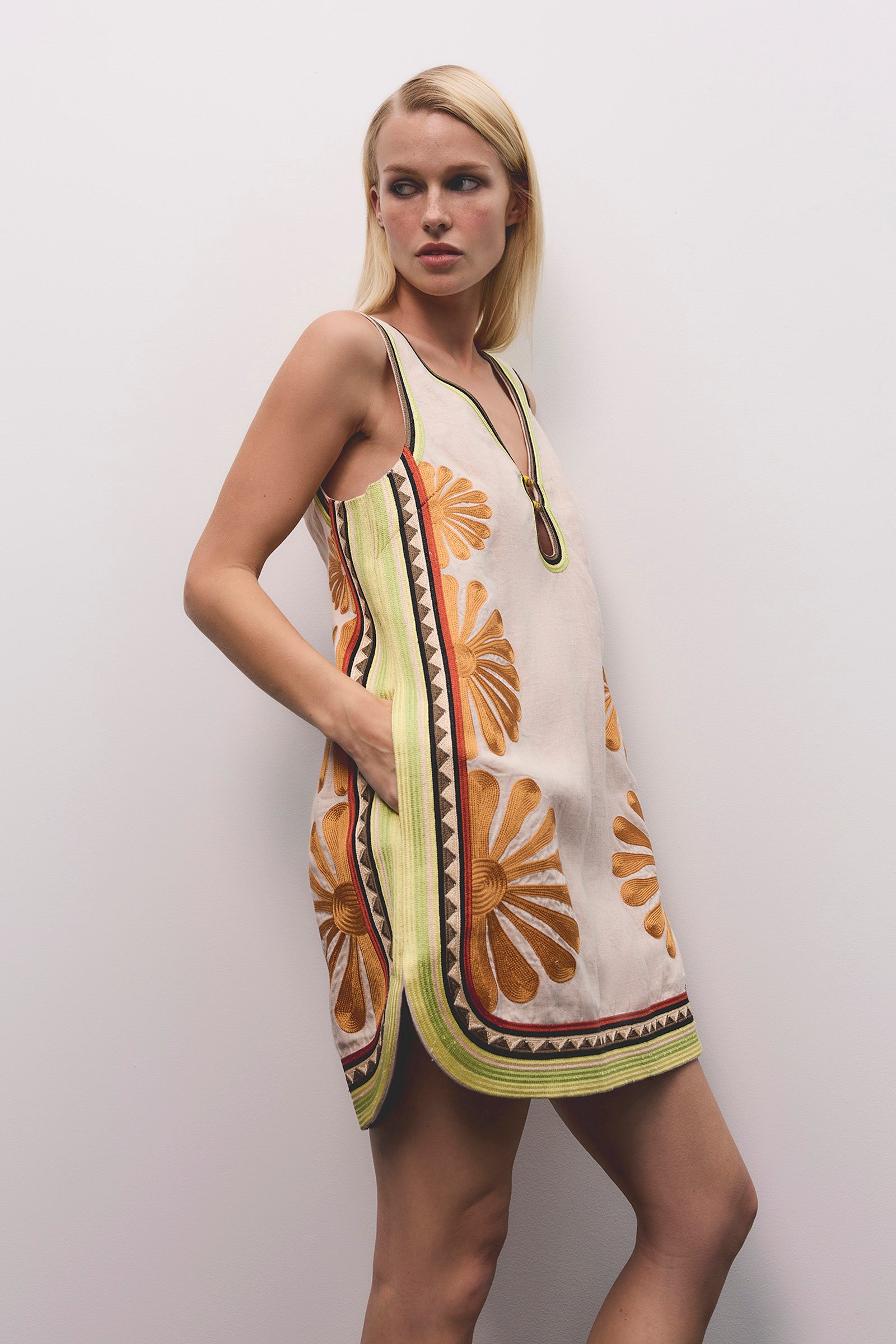 DÉJÀ VU V-NECK MINI DRESS