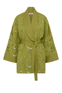 Green embroidered robe on a white background
